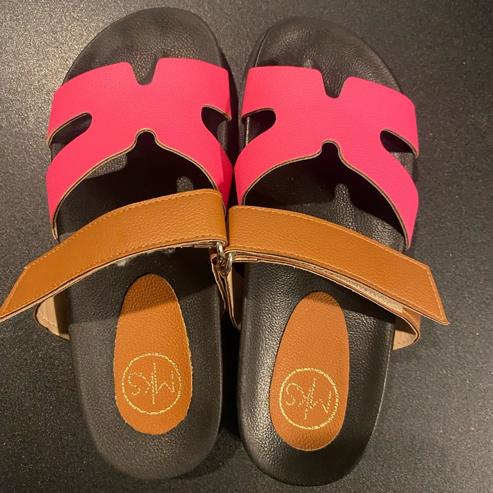 Super cute and comfy summer sandals.  Fuschia womens size 6.   Worn once.